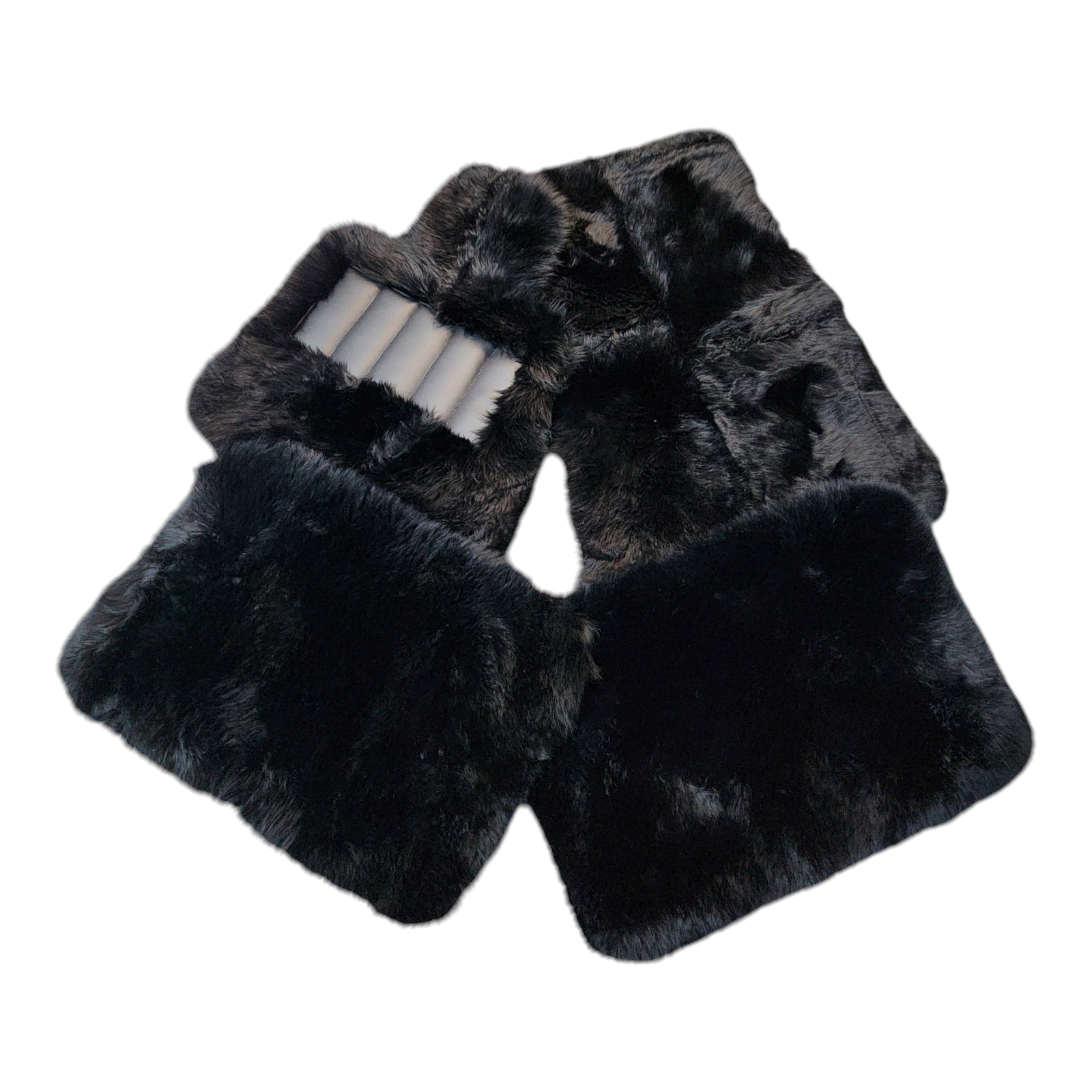 Black genuine sheepskin floor mats on a white background